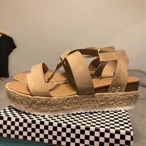 Tan colored platform sandals